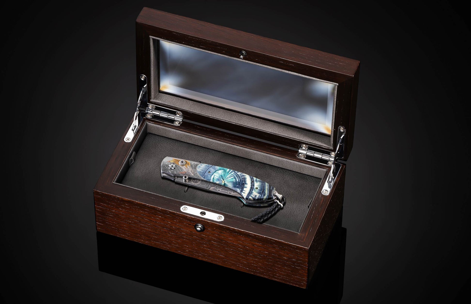 inlaid with fossil Woolly Mammoth tusk and a  hand-forged damascus steel blade by Chad Nichols