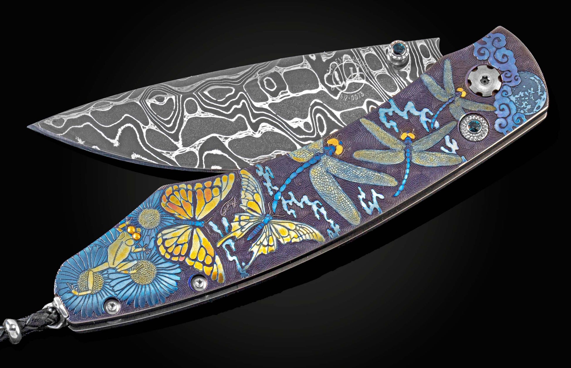 Handcrafted pocket knife from William featuring hand and laser-engraving, multi-colored anodizing, and 24K gold inlays by Tom Sterling, Kashimir Blue topaz and a hand-forged Damascus Steel blade by Chad Nichols.