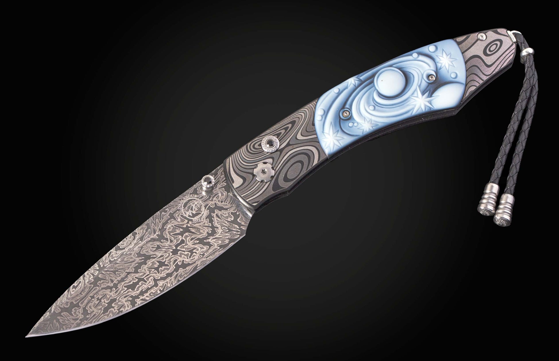  spinel gemstones and a hand-forged damascus steel blade by Luke Mattern