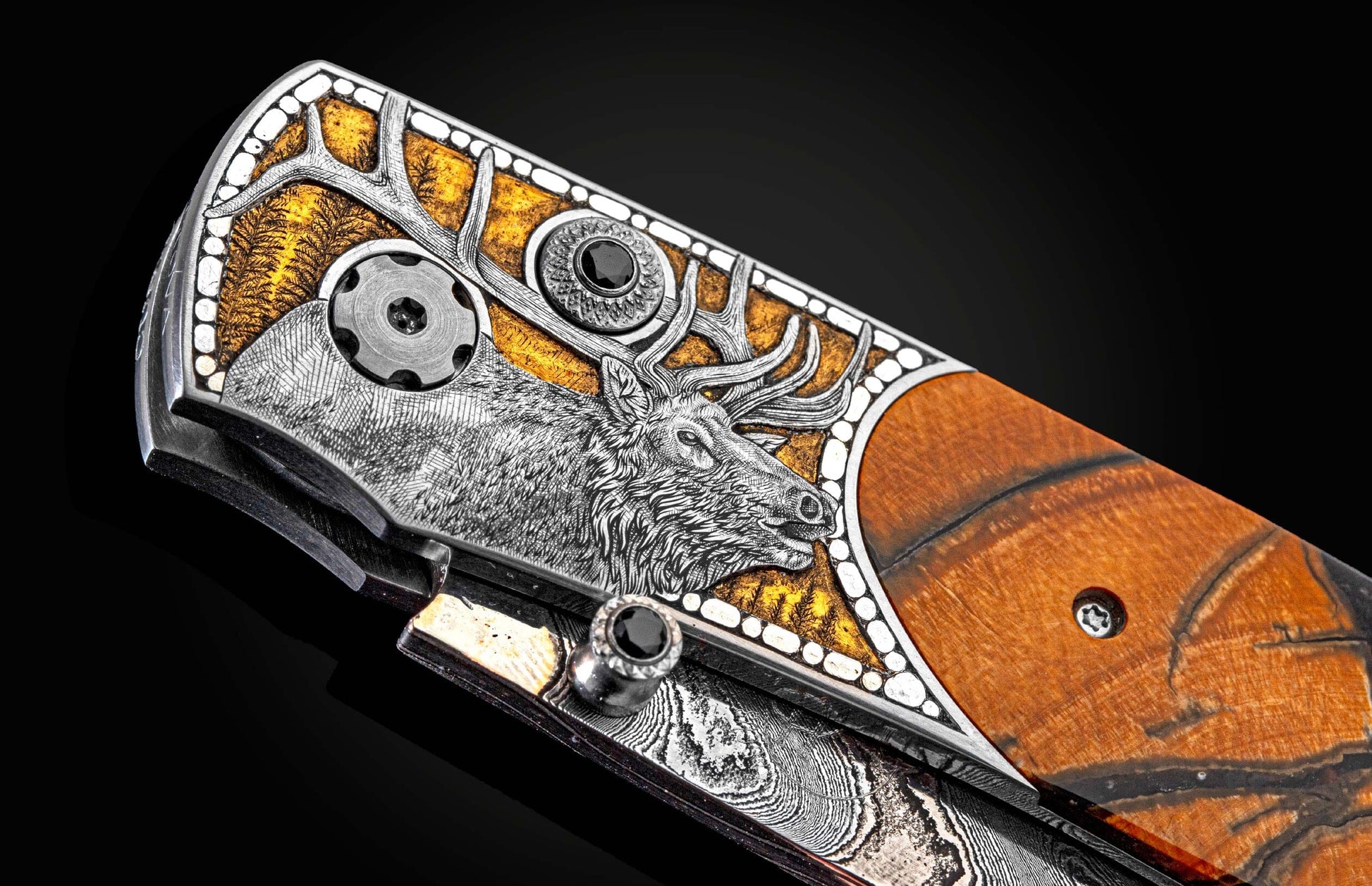 Handcrafted William Henry knife with hand-engraved depiction of elk with 24K gold inlays by Anna Sebestova