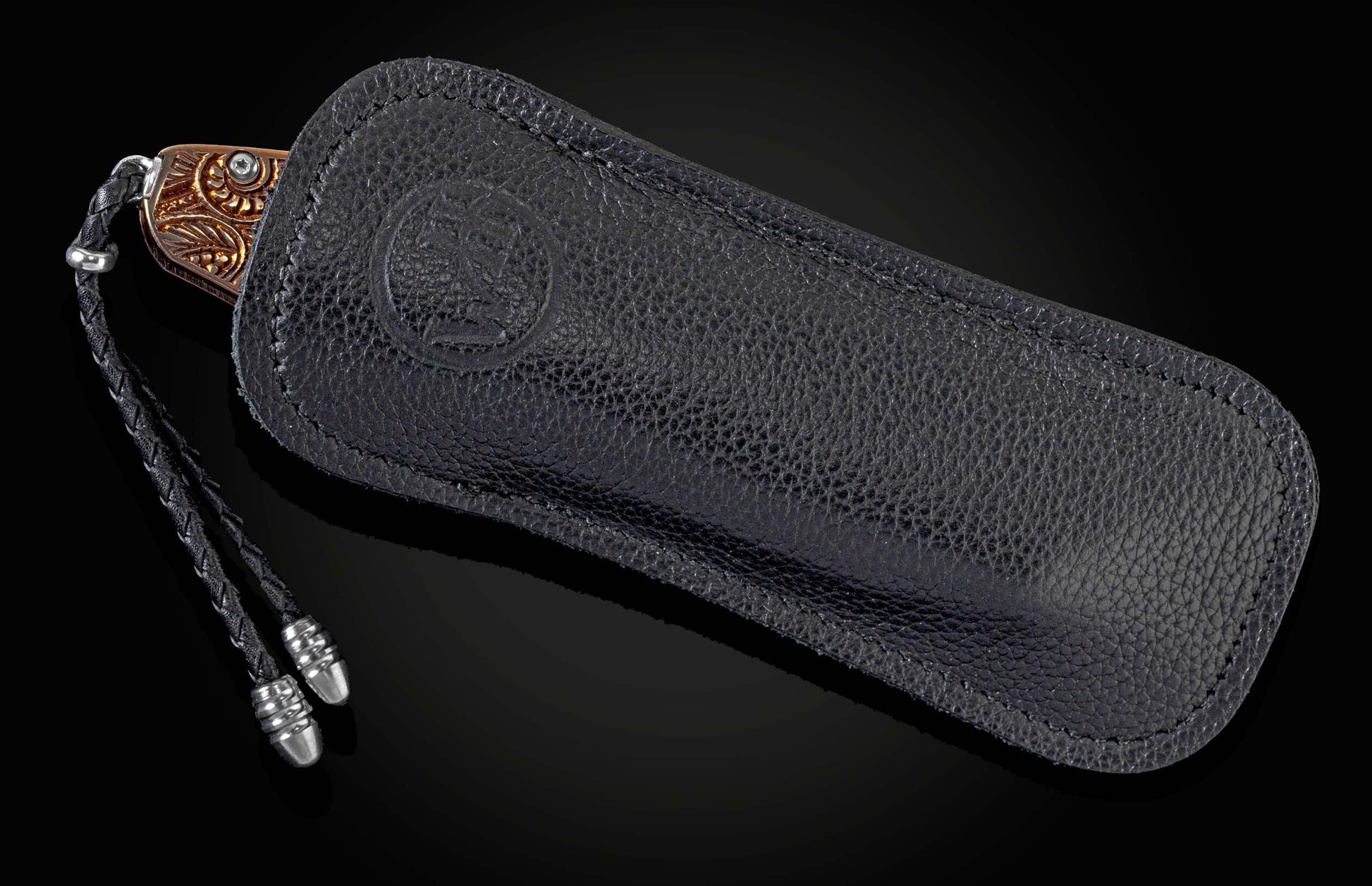 Handcrafted William Henry knife with high detail micro machined paisley pattern bronze titanium handle