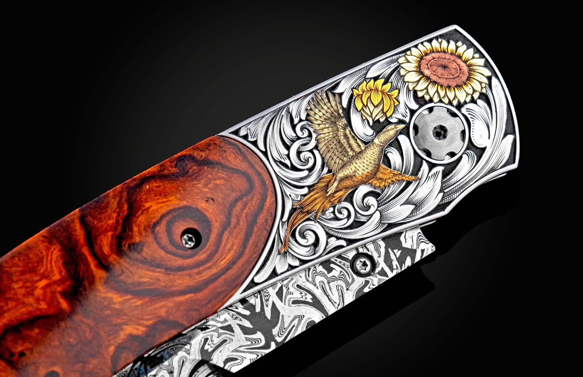  and a blade is hand-forged damascus steel blade by Luke Mattern