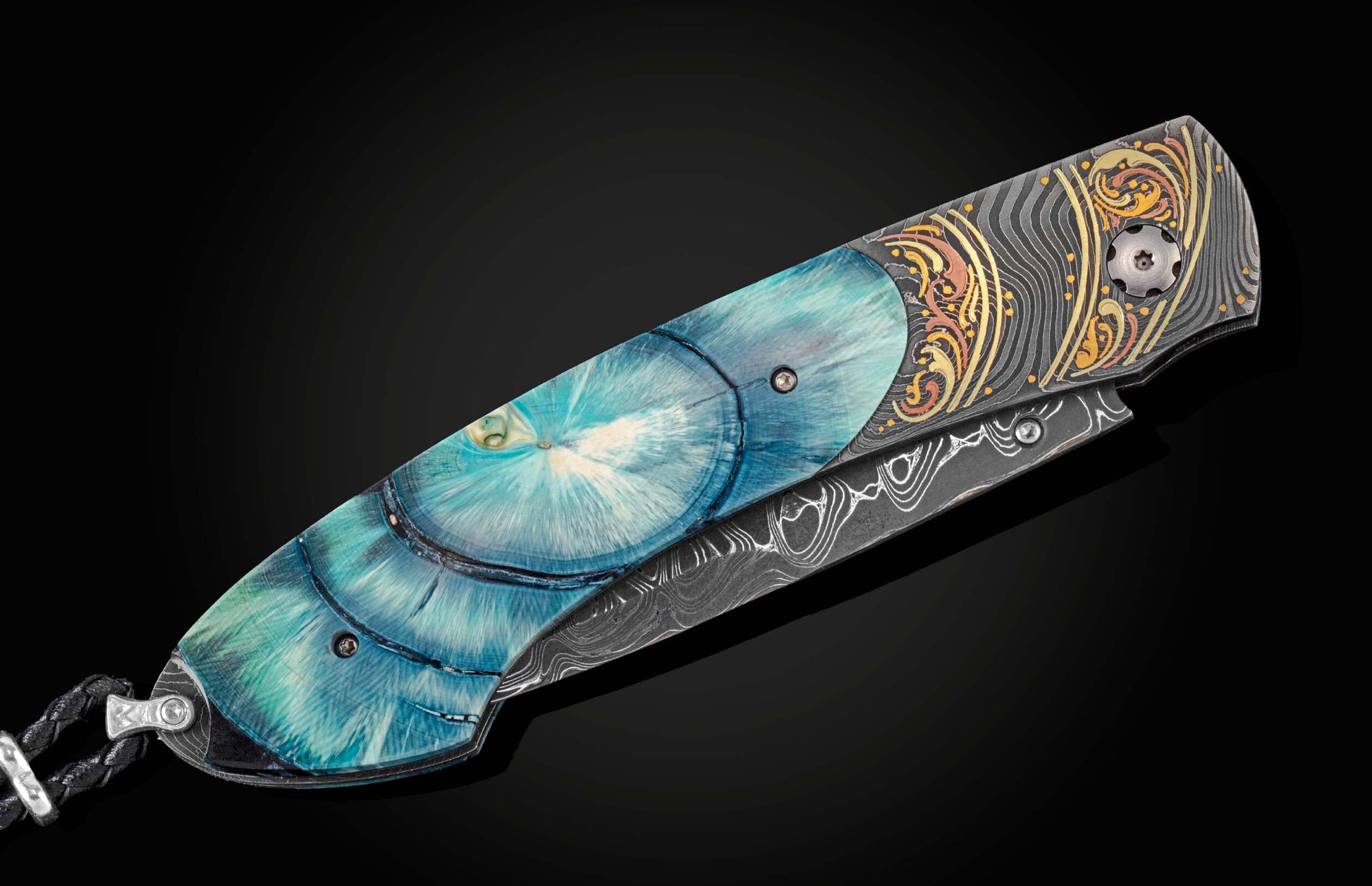  inlaid with a brilliant blue ring-cut of 10