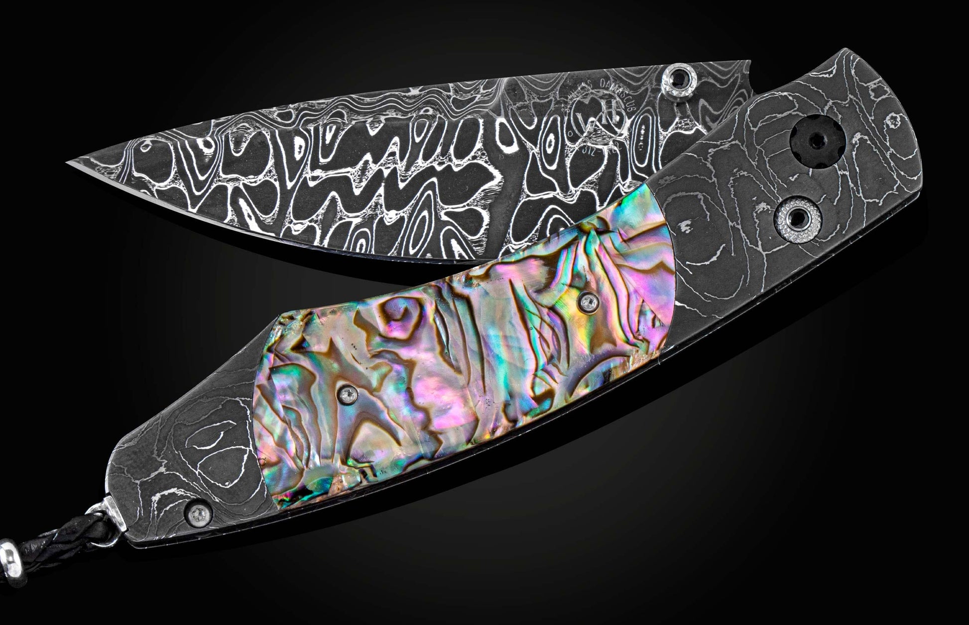 The Rip Tide Folding Knife with Hand-Forged Damascus and Abalone Shell