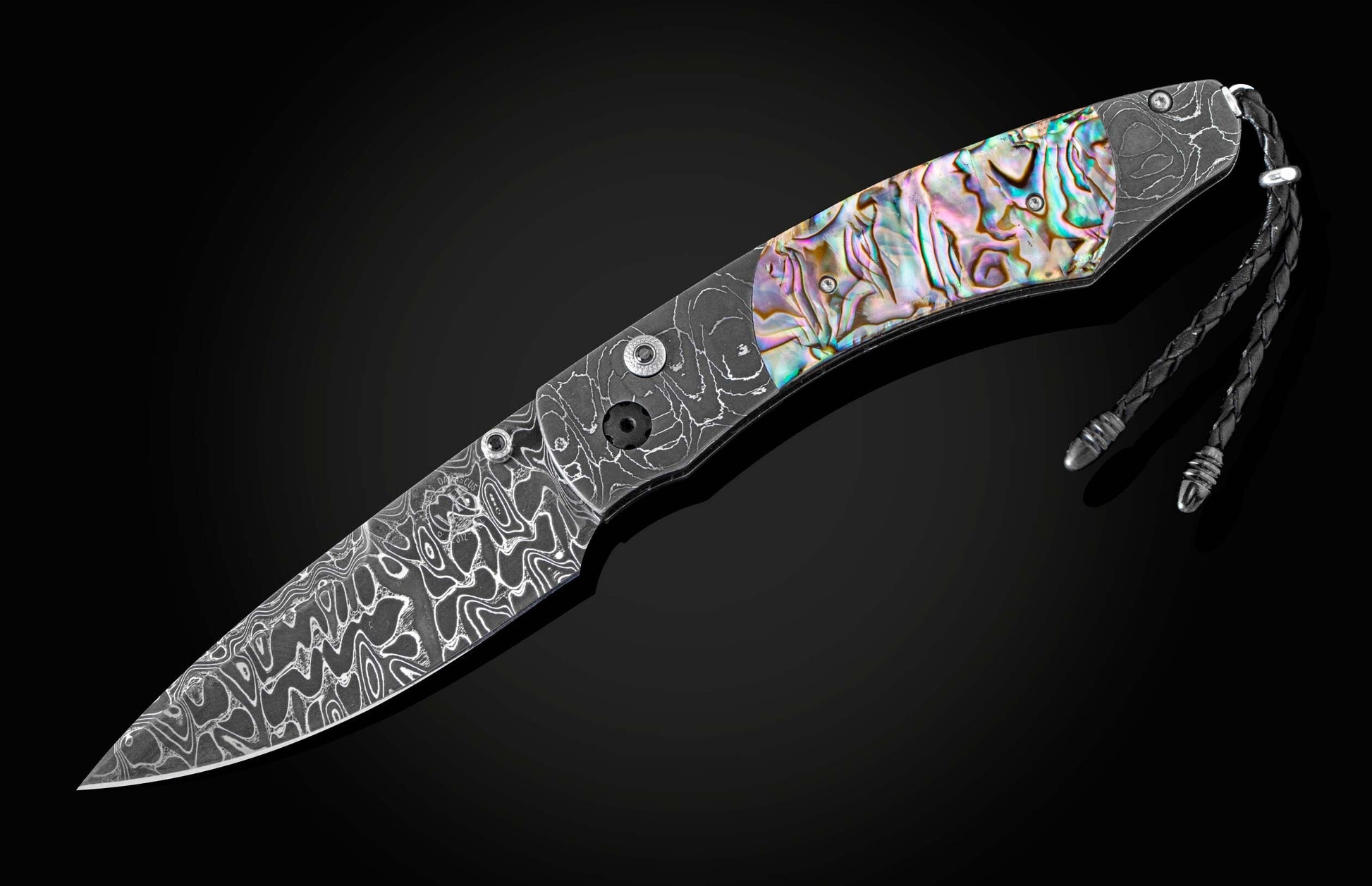 The Rip Tide Folding Knife with Hand-Forged Damascus and Abalone Shell