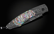 The Rip Tide Folding Knife with Hand-Forged Damascus and Abalone Shell
