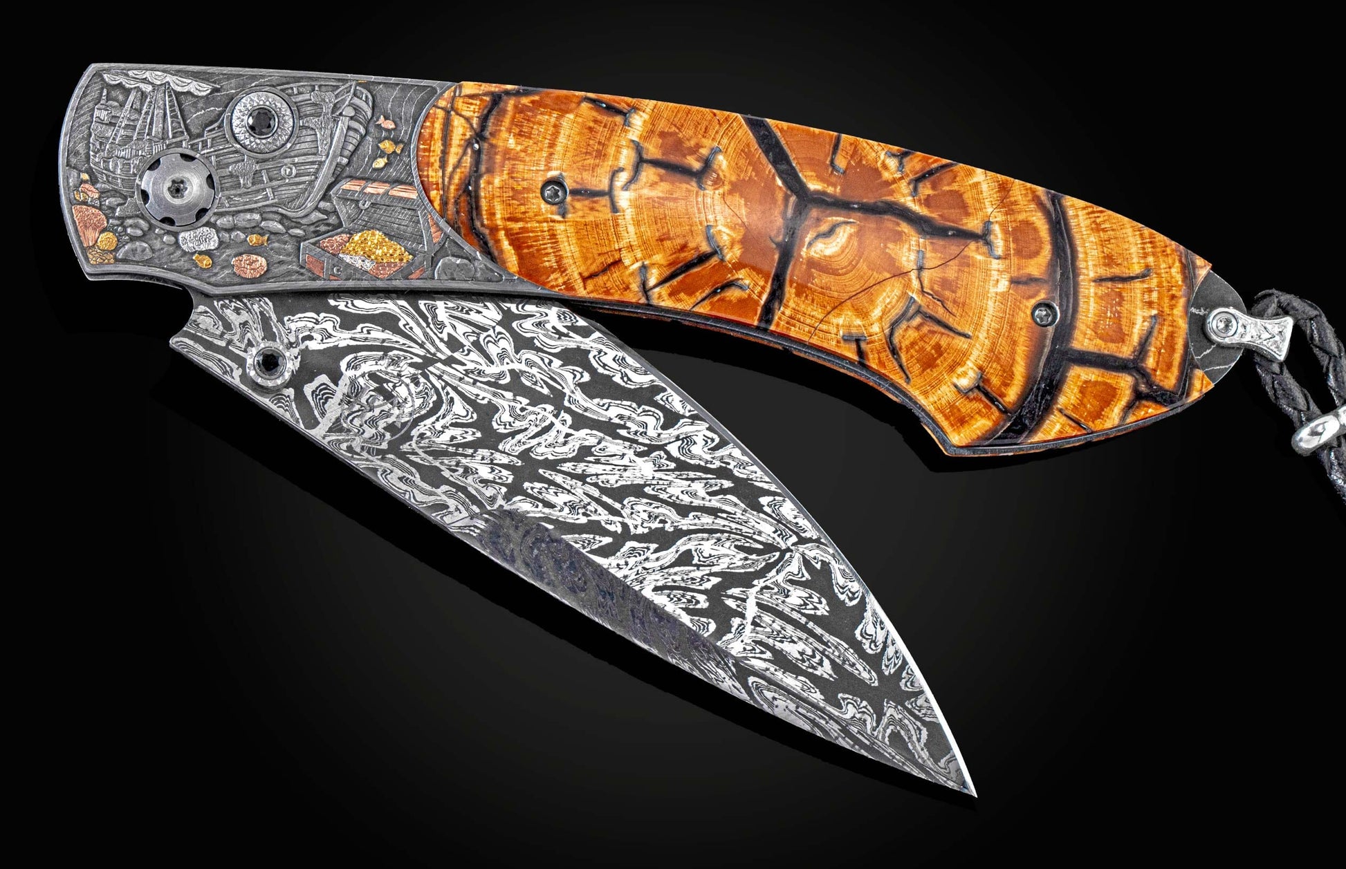 Handcrafted William Henry knife features hand-forged damascus frame by Chad Nichols, with 24K gold, copper, brass, and silver inlays by Narimantis Palsis, inlaid with fossil Woolly Mammoth tusk, spinel gemstones and hand-forged damascus steel blade by Luk