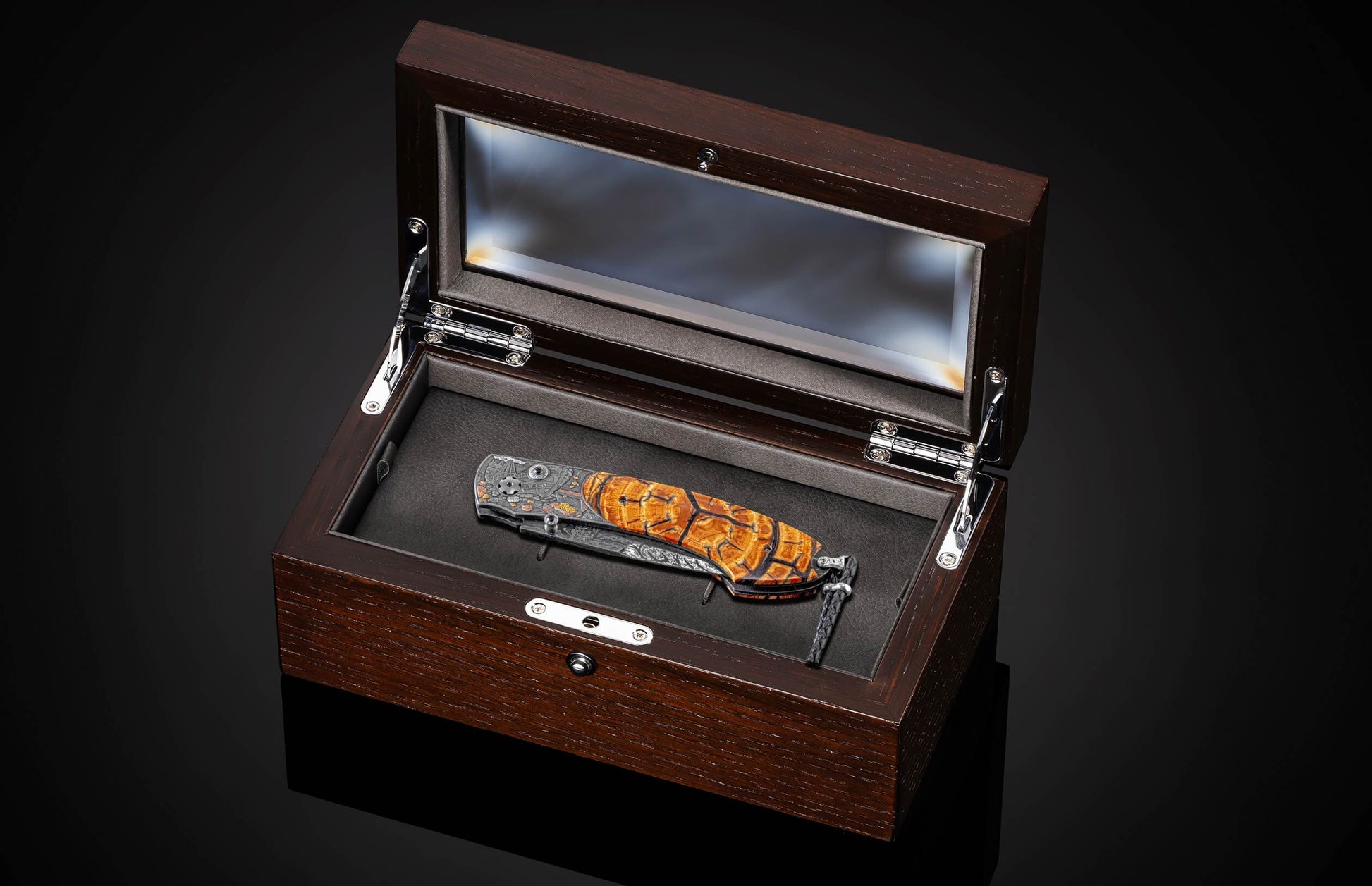 Handcrafted William Henry knife features hand-forged damascus frame by Chad Nichols