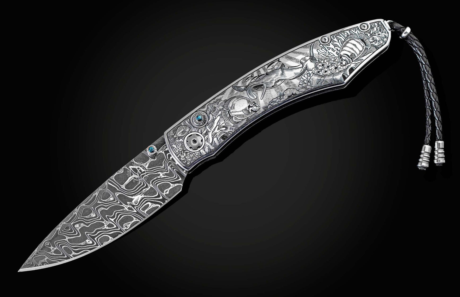  and a hand-forged Damascus steel blade by Chad Nichols
