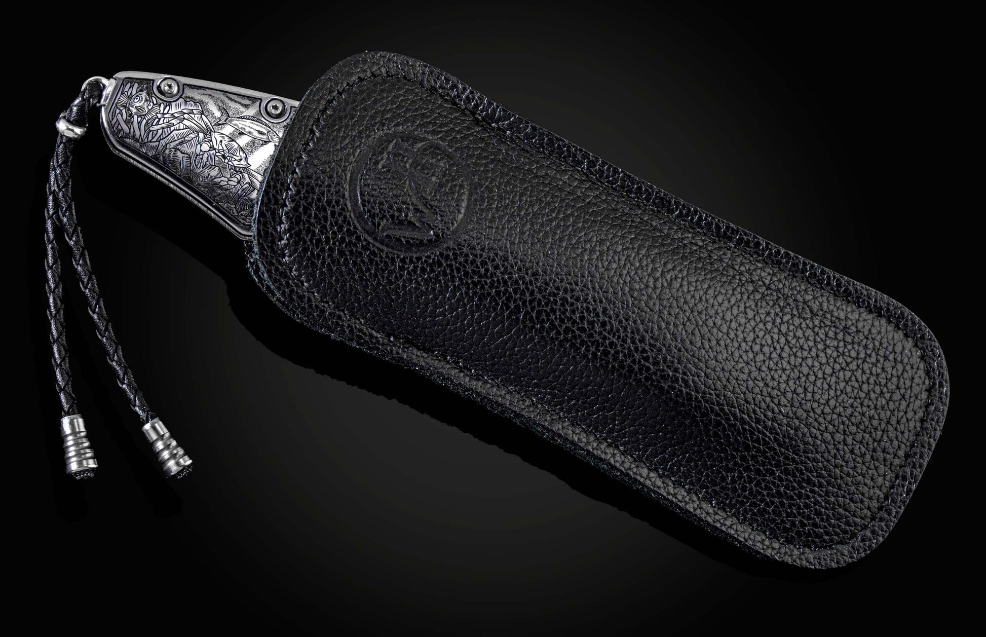  and a hand-forged Damascus steel blade by Chad Nichols