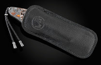  and a hand-forged damascus steel blade by Luke Mattern