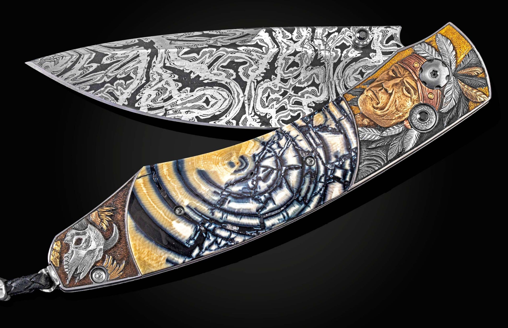 Handcrafted William Henry knife with hand-engraved bolsters depicting native Americans with 22K & 24K gold, silver, copper and tombac inlays by Dusan Hronec, fossil Woolly Mammoth tusk, spinel gemstones, and hand-forged damascus steel blade by Luke Matter
