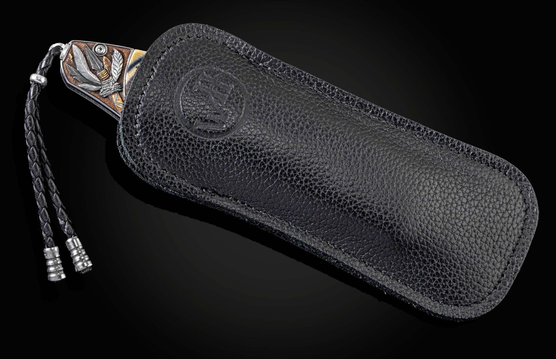 Handcrafted William Henry knife with hand-engraved bolsters depicting native Americans with 22K & 24K gold