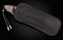 Handcrafted pocket knife from William Henry features a hand-engraved frame with 24K & 22K gold