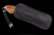  and hand-forged damascus steel blade by Chad Nichols.