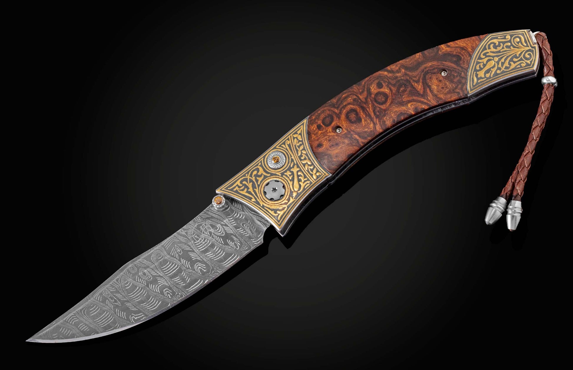 Handcrafted pocket knife from William Henry features a beautiful frame in 24K gold Koftgari