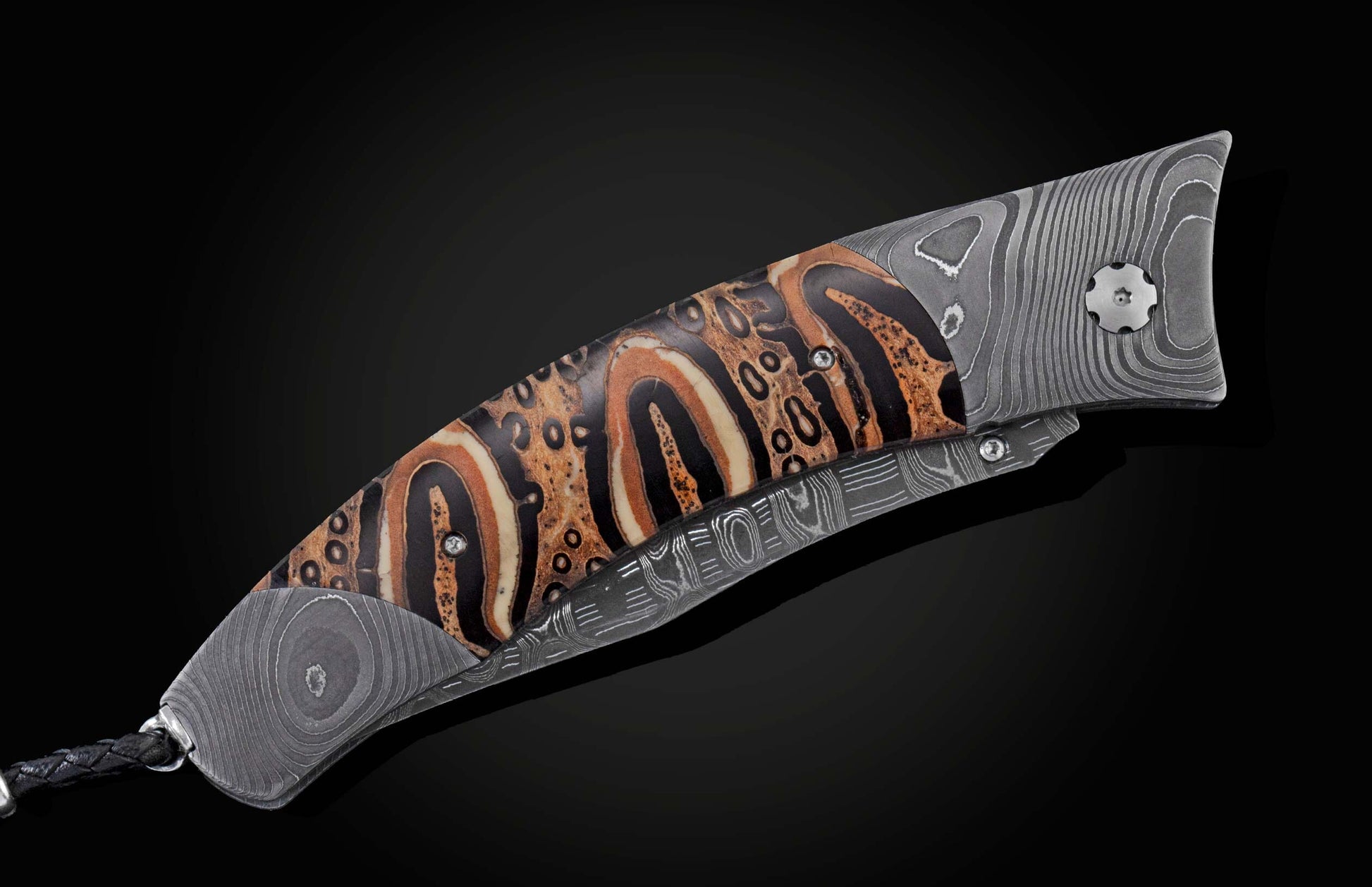  inlaid with Ponga Fern wood which grows only in New Zealand. The blade is hand-forged Damascus steel and the button lock and the thumb stud are set with smoky quart