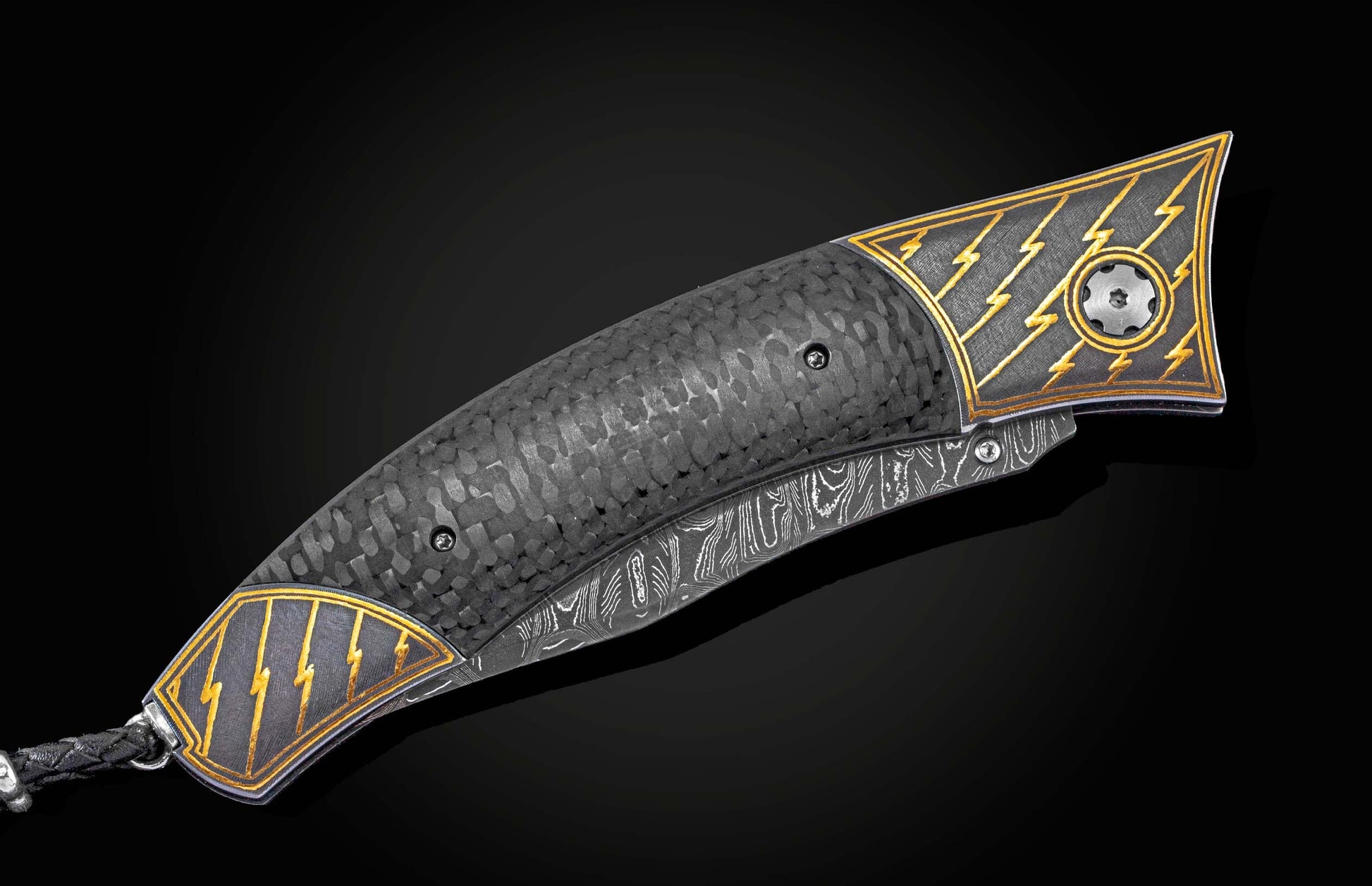Handcrafted pocket knife from William Henry featuring a frame in 24K gold Koftgari