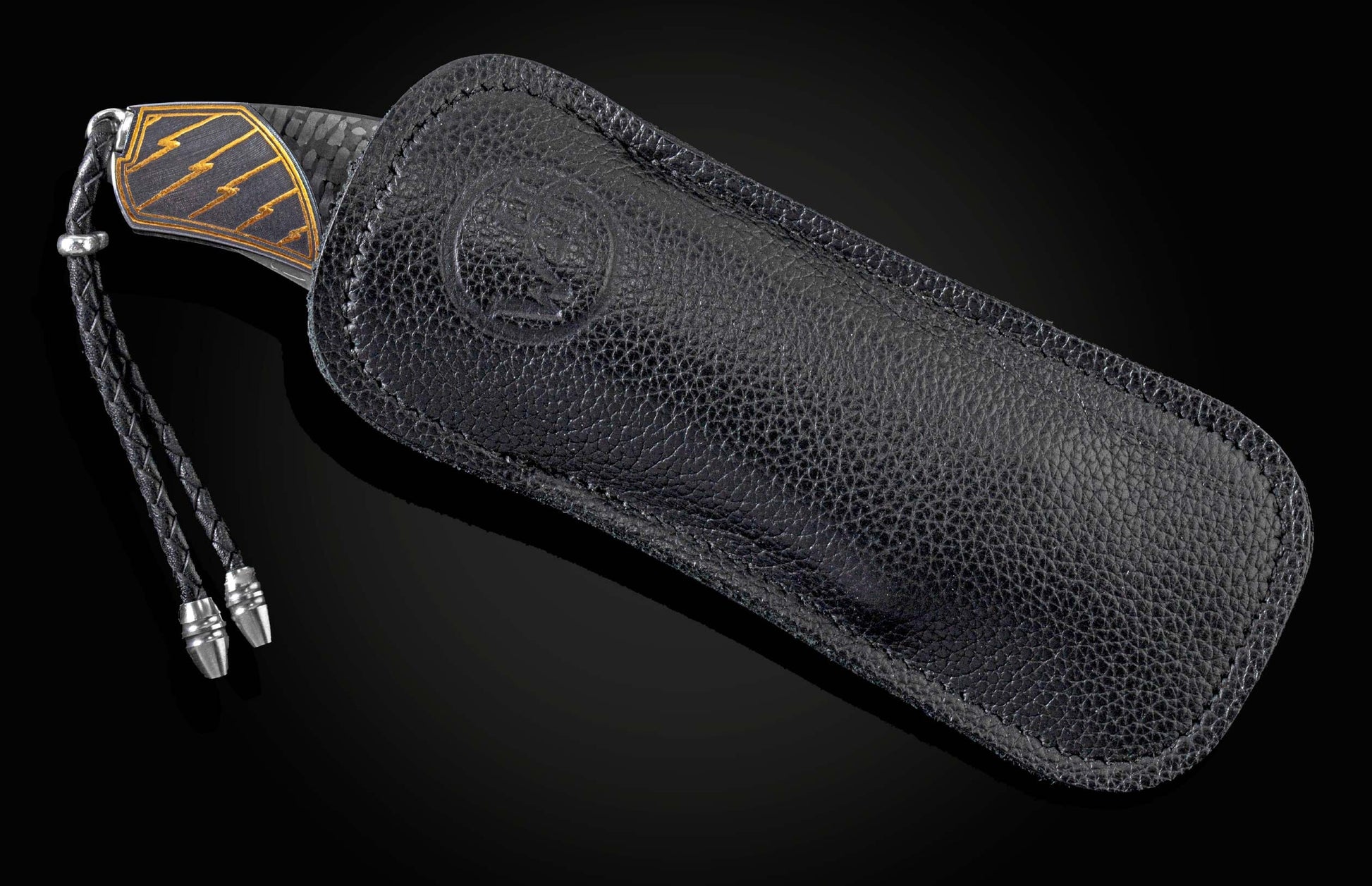  spinel gemstones and a hand-forged 'Hornets Nest' Damascus steel blade by Mike Norris.