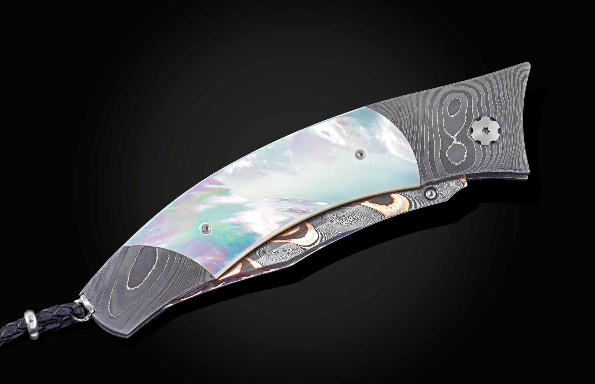  and a  damascus steel blade by Baker Forge.