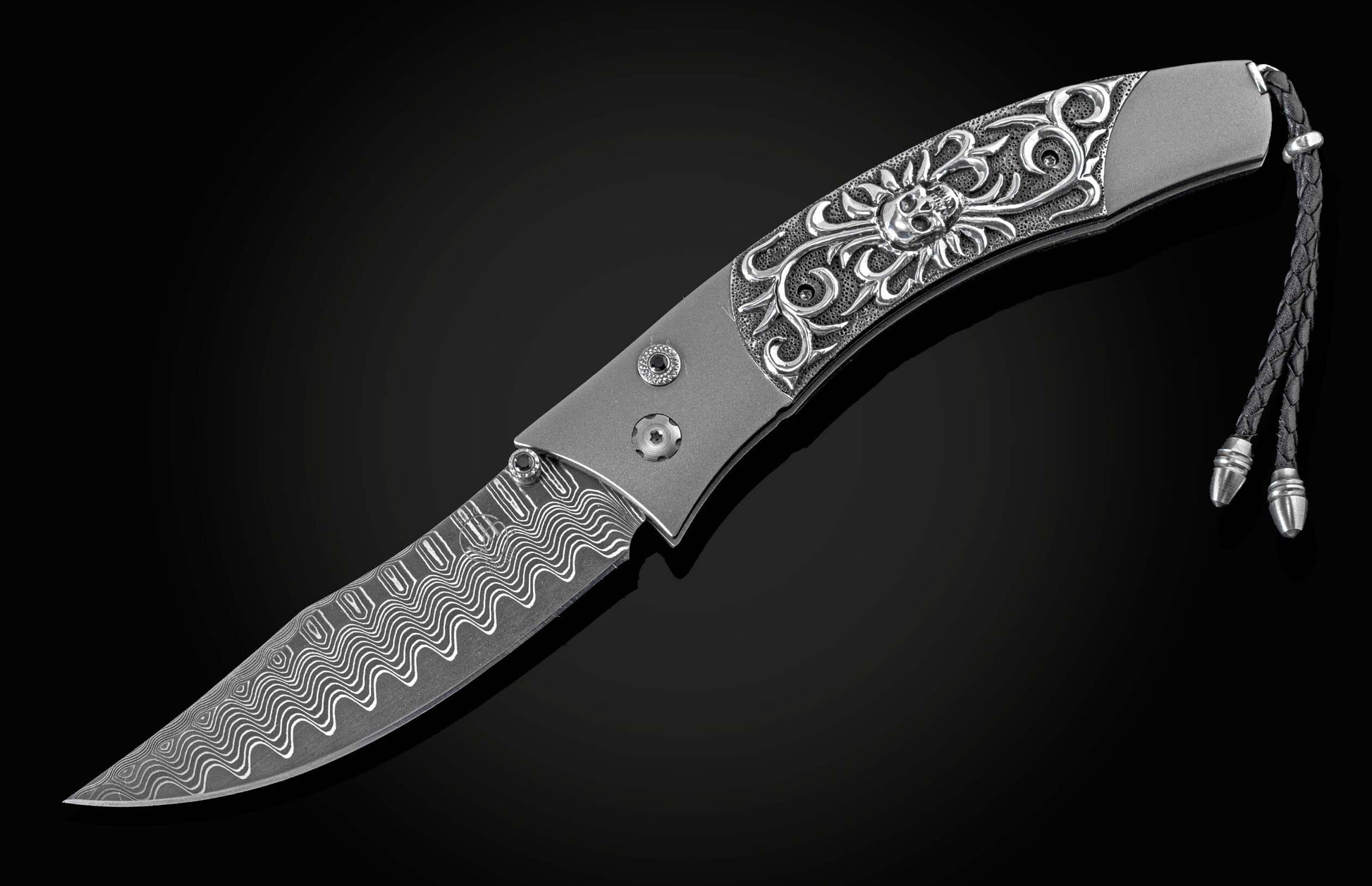  and a Damascus steel blade.