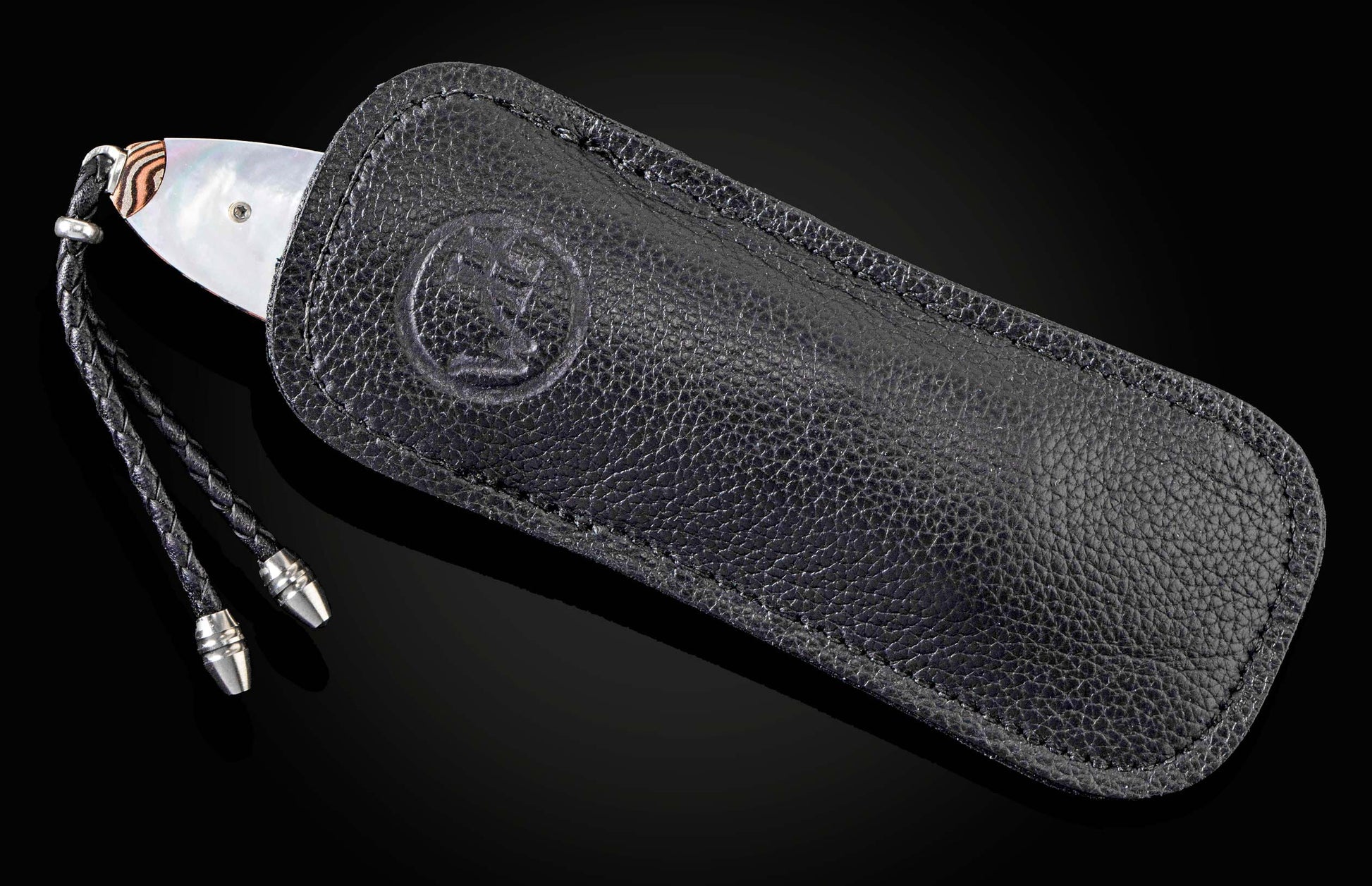  and a hand-forged Damascus steel blade by Mike Norris