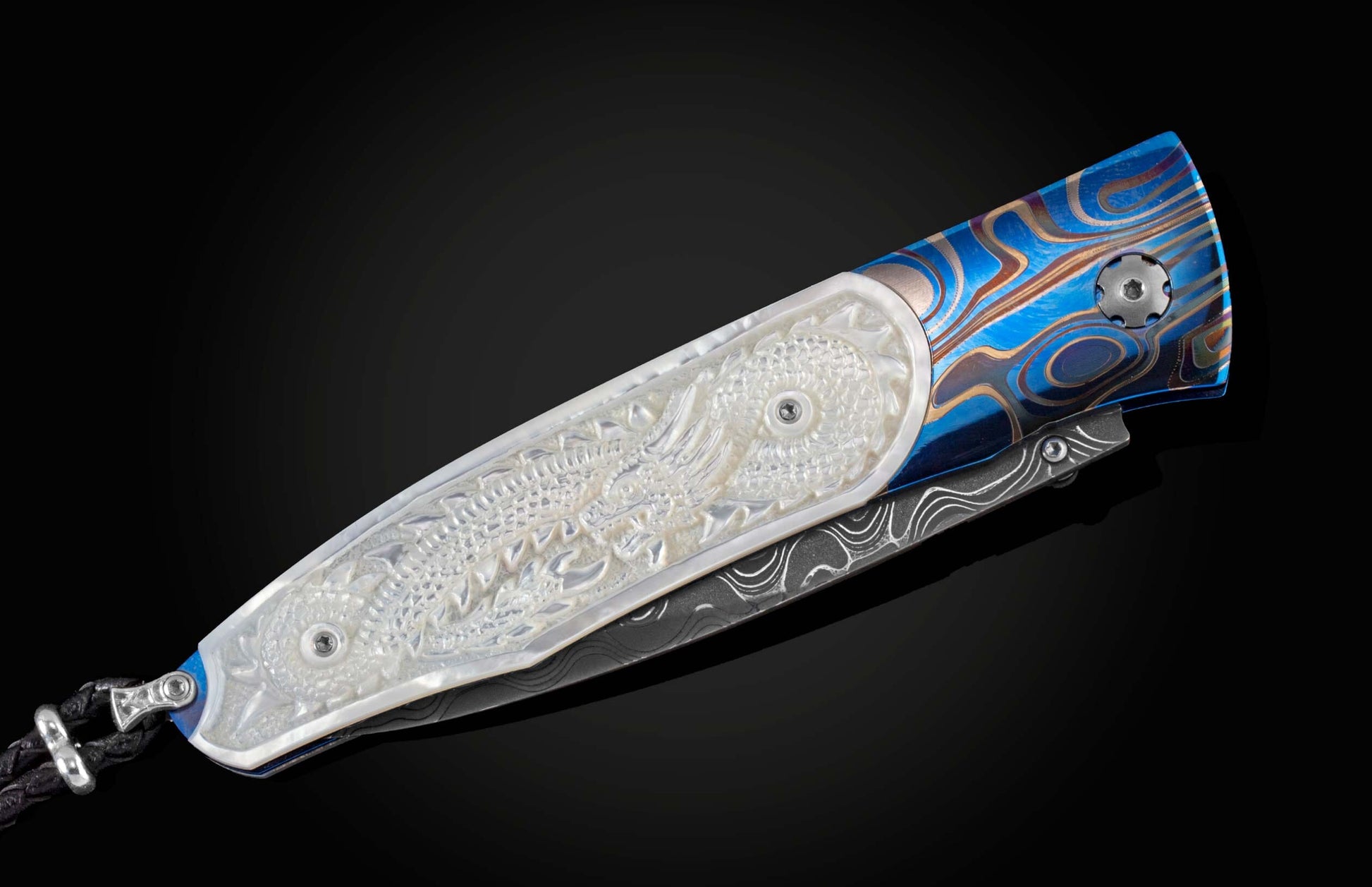  and a hand-forged damascus steel blade by Luke Mattern