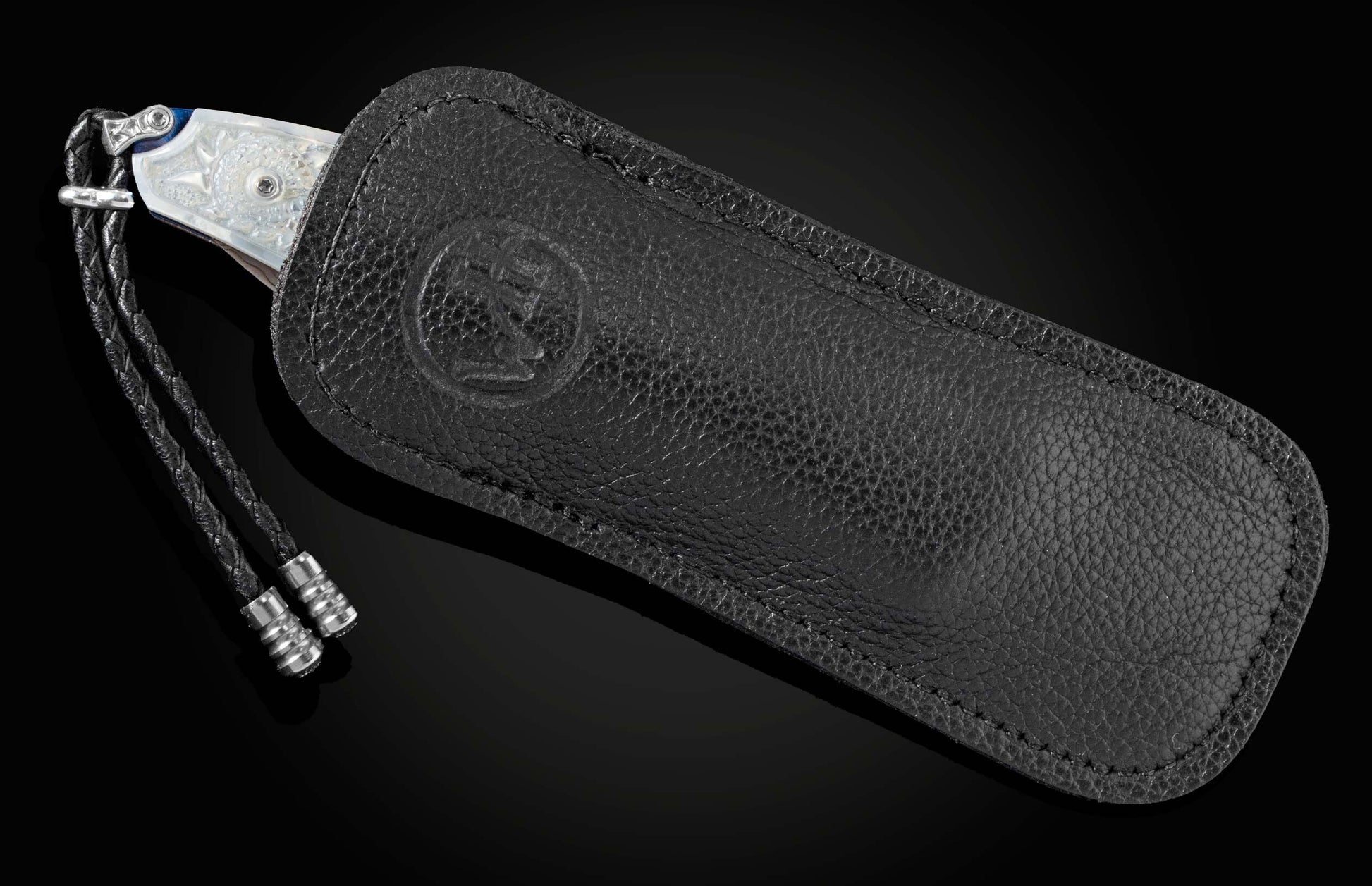 Handcrafted William Henry pocket knife with blue titanium frame