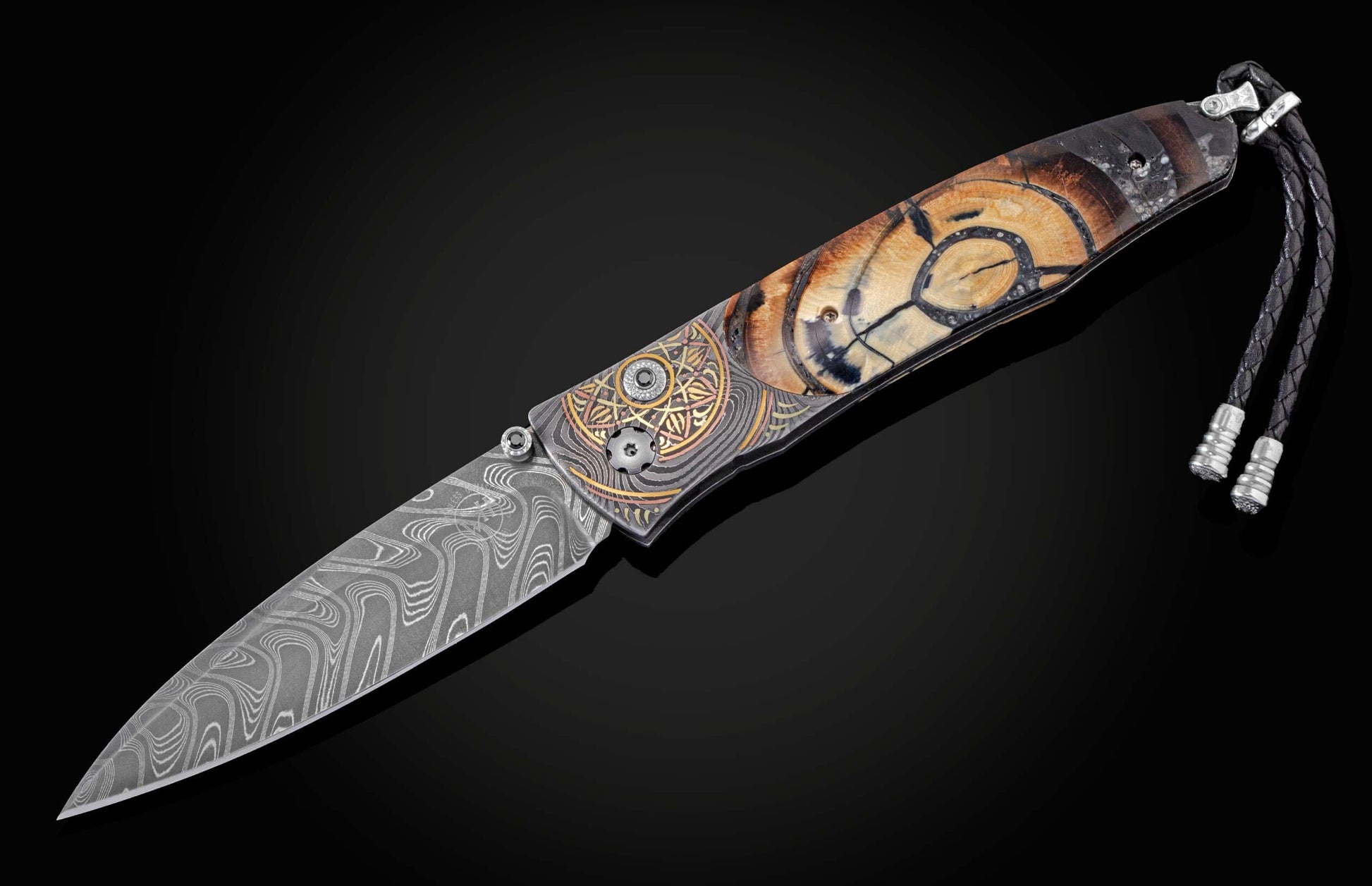  and copper inlays in geometric forms. Scales are inlaid with fossil ring-cut mammoth tusk. The blade is hand-forged Damascus s