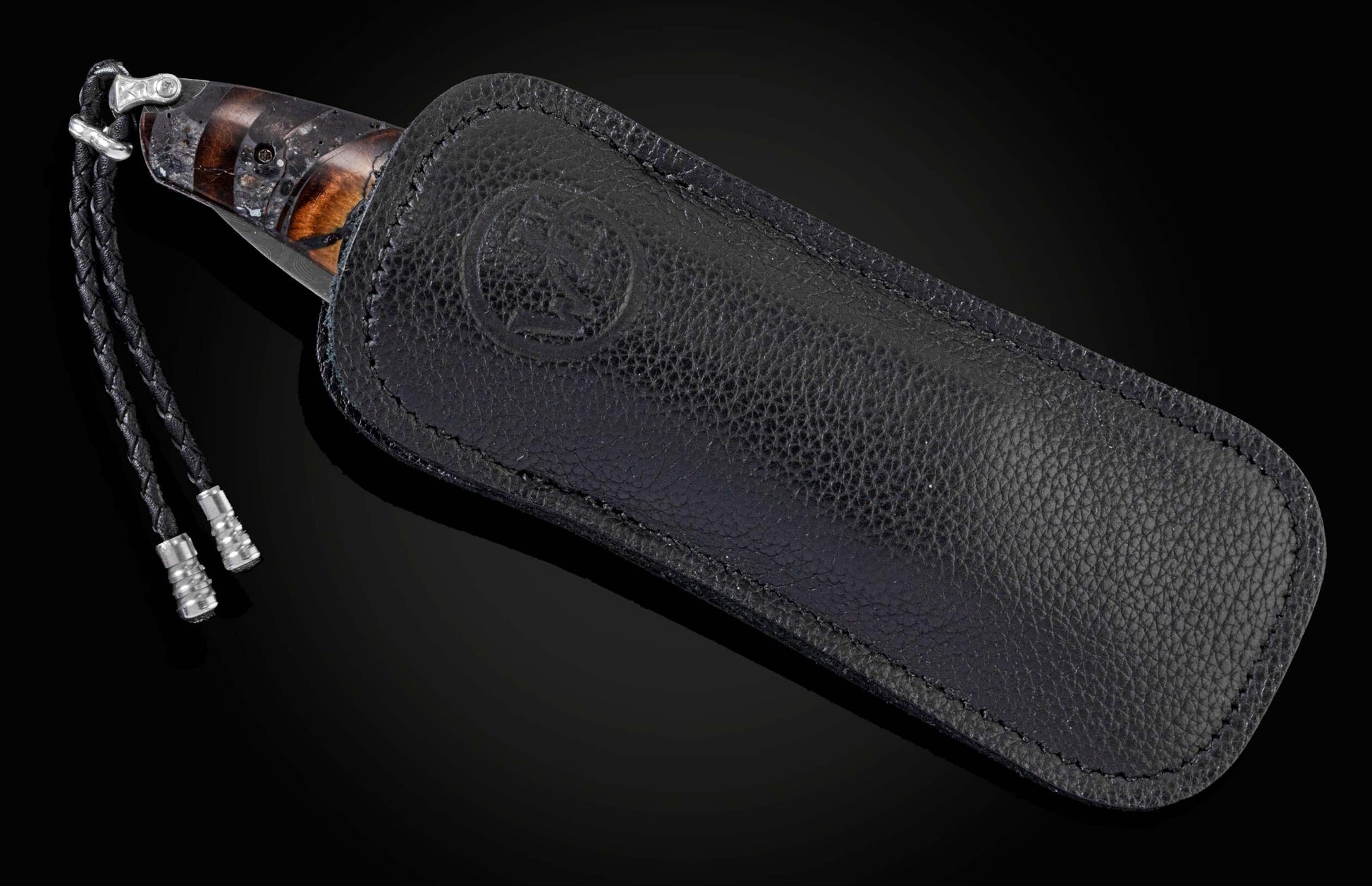  and copper inlays in geometric forms. Scales are inlaid with fossil ring-cut mammoth tusk. The blade is hand-forged Damascus s