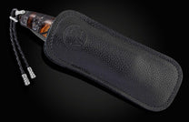  and copper inlays in geometric forms. Scales are inlaid with fossil ring-cut mammoth tusk. The blade is hand-forged Damascus s