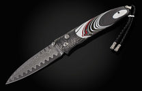 The Flathead Damascus Pocket Knife with Fordite Scales 