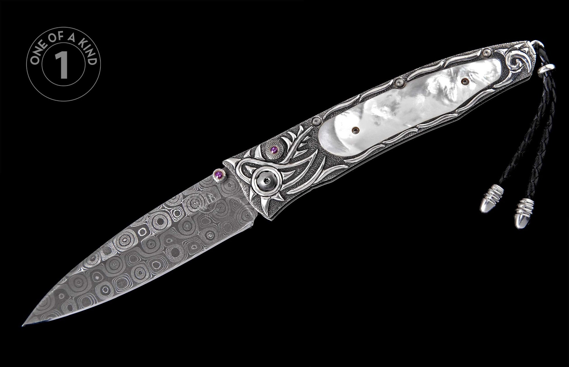 Ornate folding knife with a patterned Damascus steel blade, silver-toned handle featuring mother-of-pearl, purple gemstones, and a black leather lanyard.