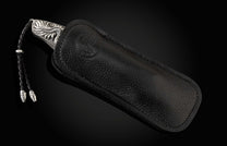 The GenTac Sterling Silver Dragon Pocket Knife in a leather case