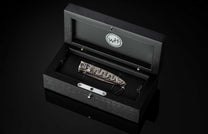 The GenTac Sterling Silver Dragon Pocket Knife in a case