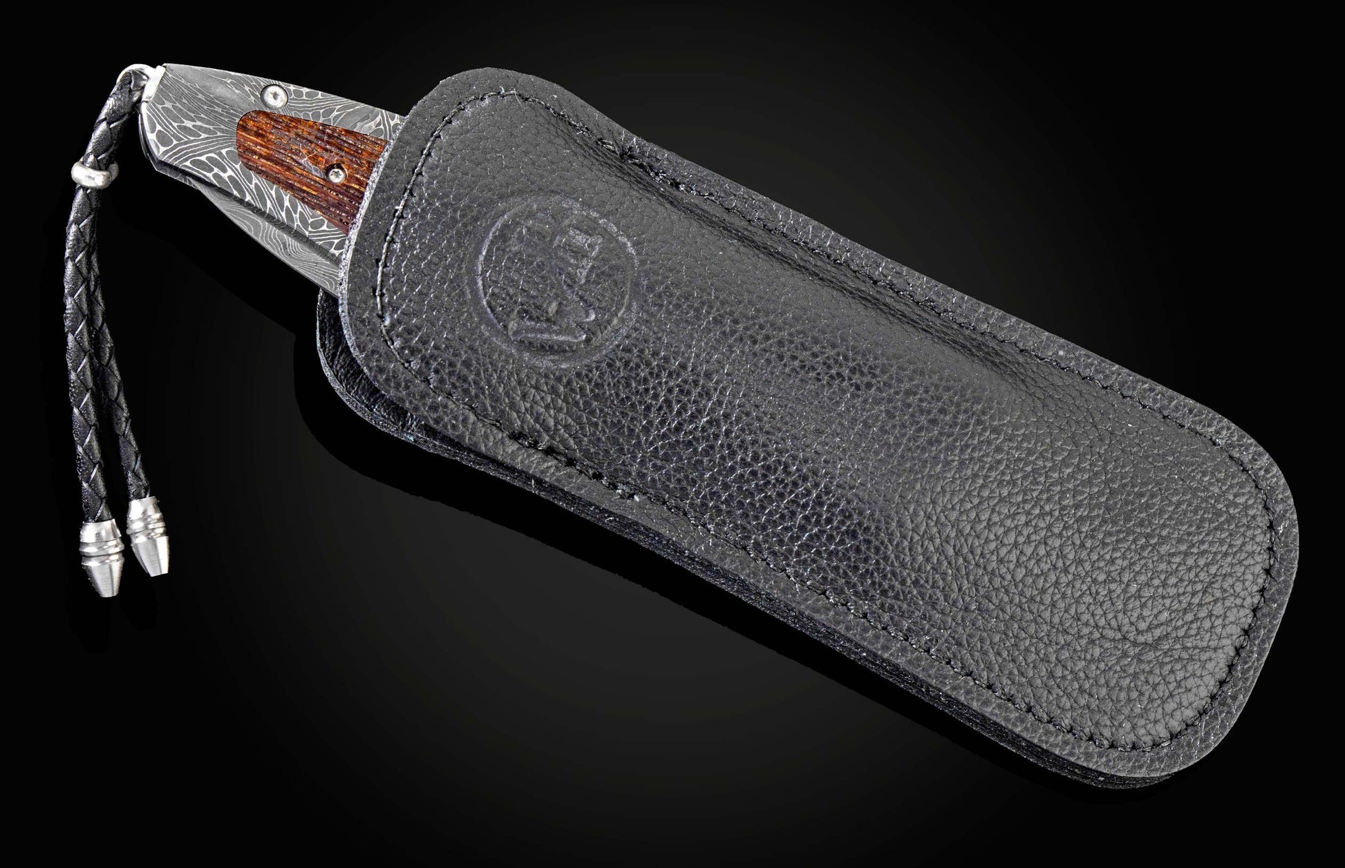 Handcrafted William Henry knife with hand-forged Damascus steel frame