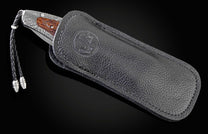 Handcrafted William Henry knife with hand-forged Damascus steel frame