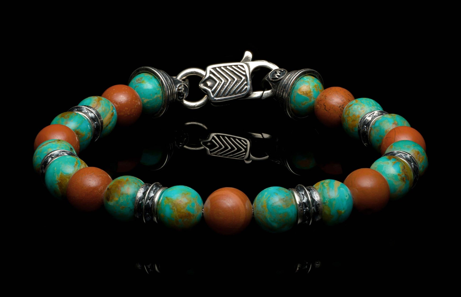 Handcrafted William Henry men's bracelet Kingman features turquoise with deep red jasper beads, sterling silver accents and a custom clasp.