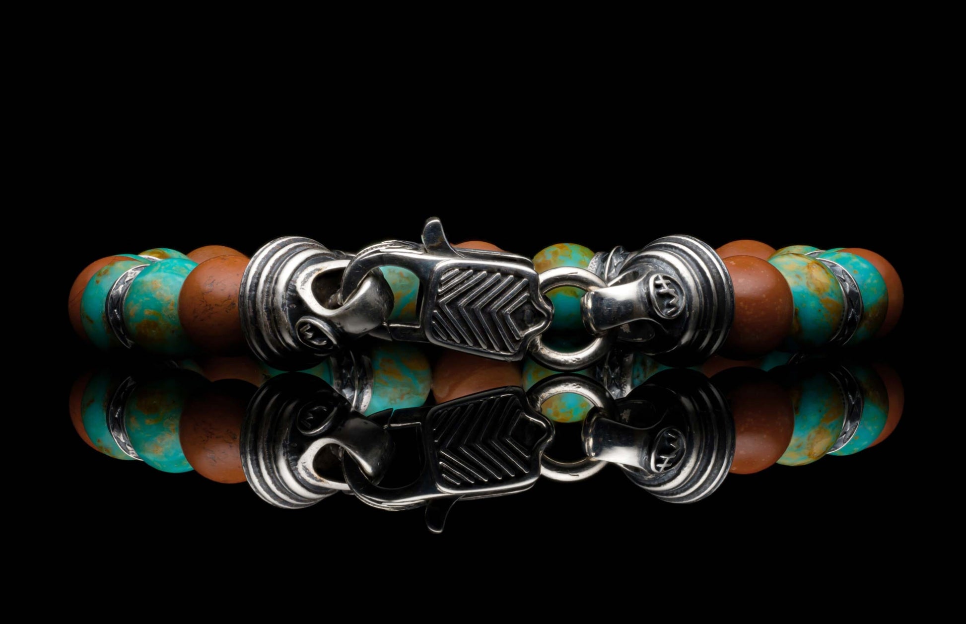  sterling silver accents and a custom clasp.