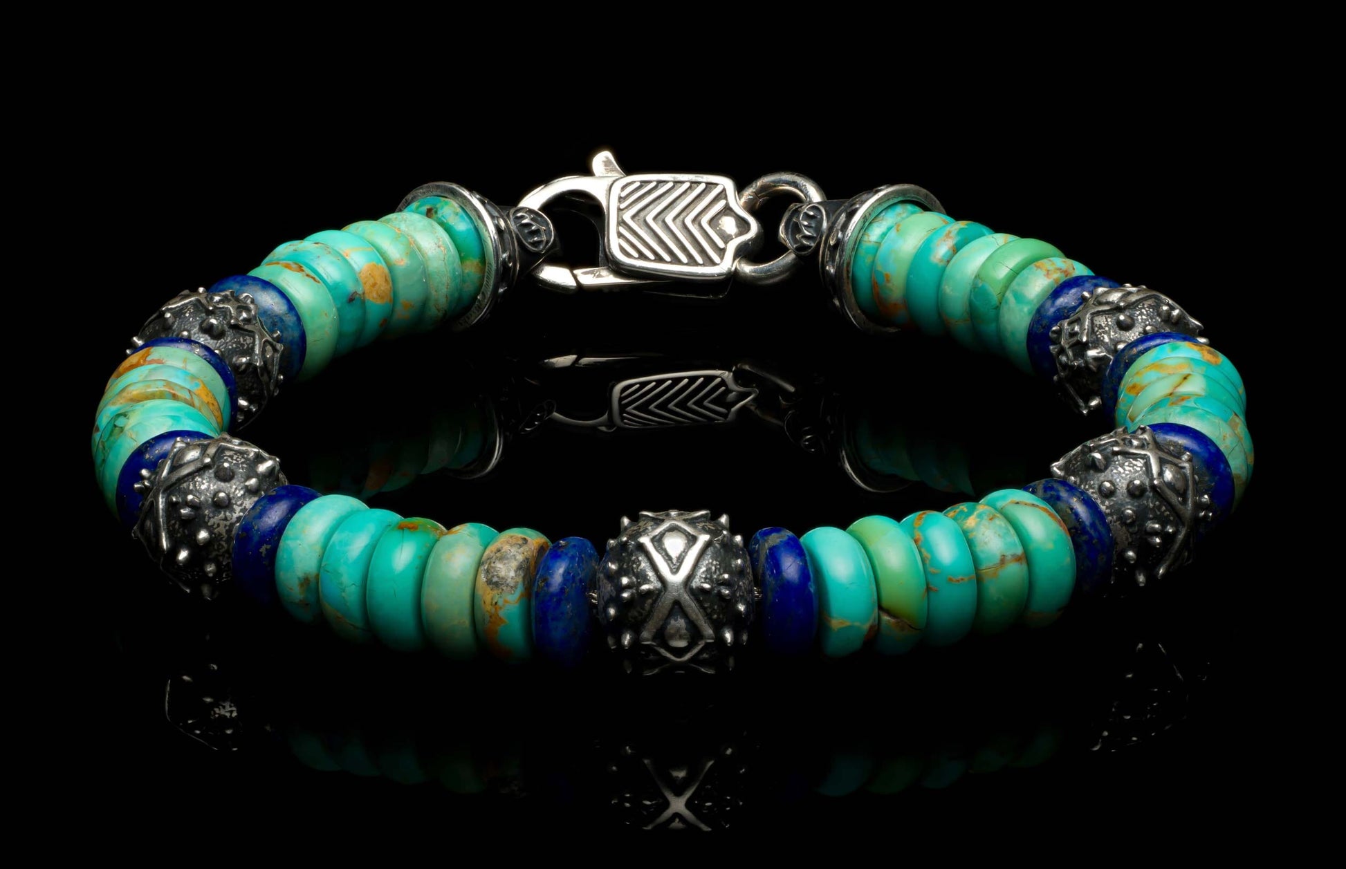 Handcrafted William Henry men's bracelet with  Kingman turquoise and lapis lazuli rondelle beads, accented with sculpted sterling silver and a custom clasp