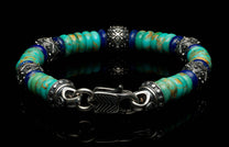  accented with sculpted sterling silver and a custom clasp