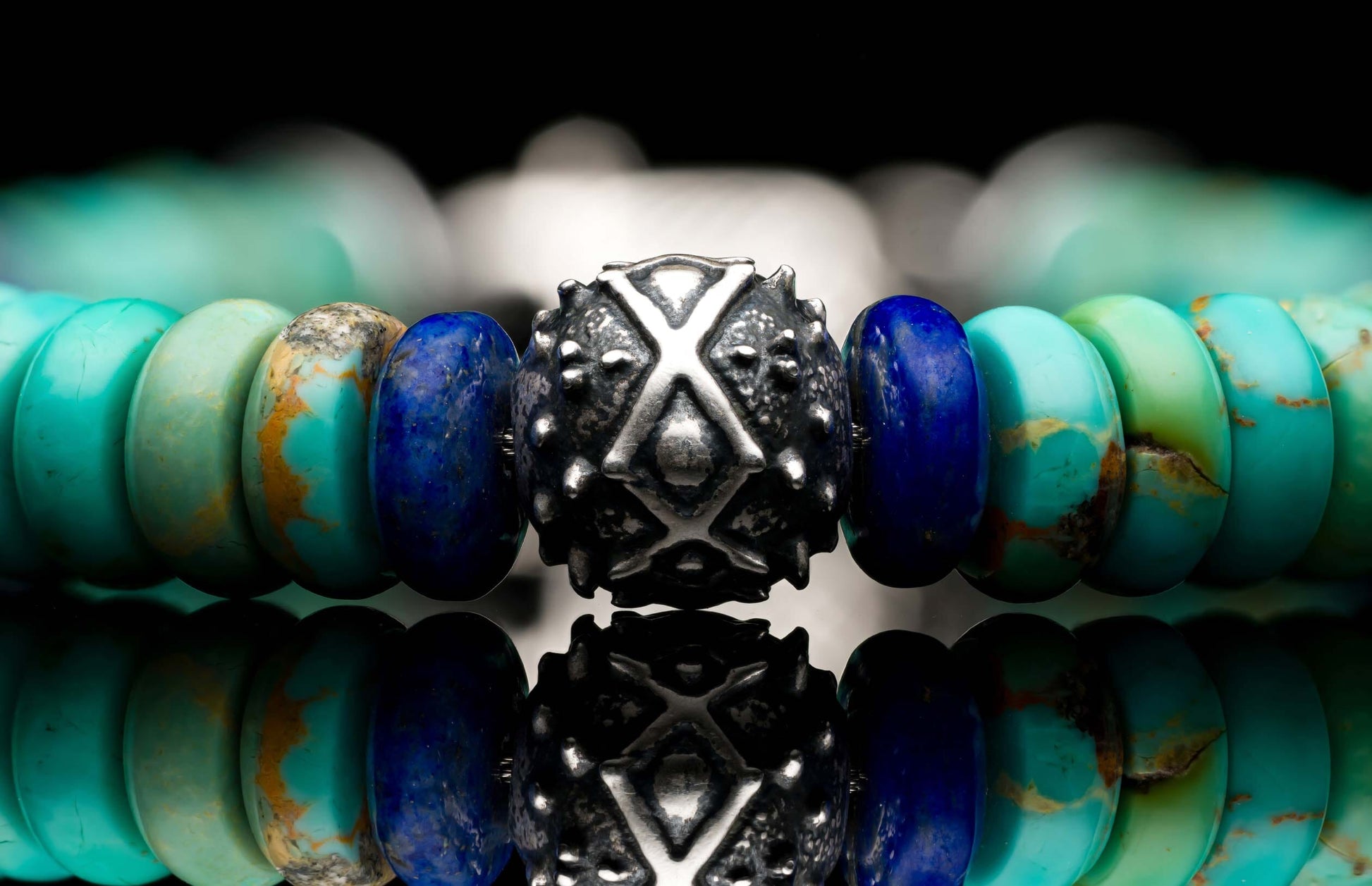  accented with sculpted sterling silver and a custom clasp