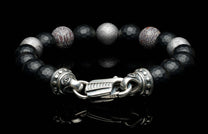 Handcrafted William Henry men's bracelet blends dinosaur bone and Gibeon meteorite beads with matte faceted black onyx and a custom clasp