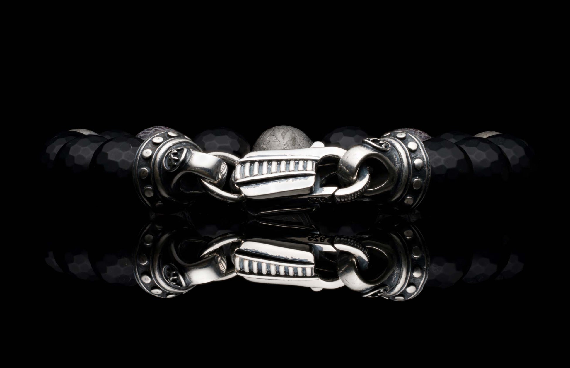 Handcrafted William Henry men's bracelet blends dinosaur bone and Gibeon meteorite beads with matte faceted black onyx and a custom clasp