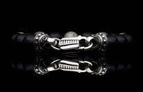 Handcrafted William Henry men's bracelet blends dinosaur bone and Gibeon meteorite beads with matte faceted black onyx and a custom clasp