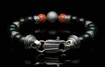  accented with sculpted sterling silver and a custom clasp