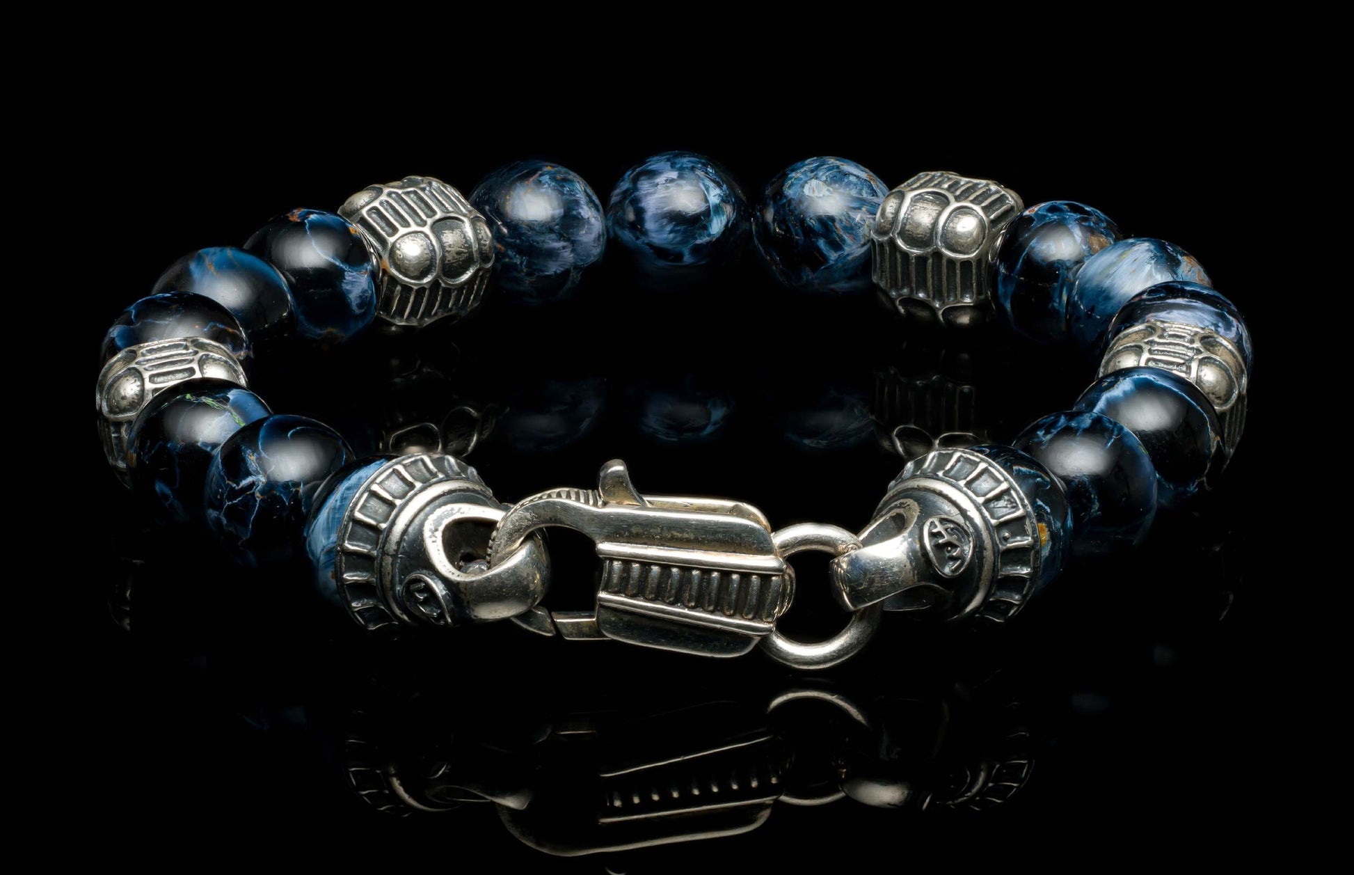  quilted sterling silver cube accents and a custom clasp.