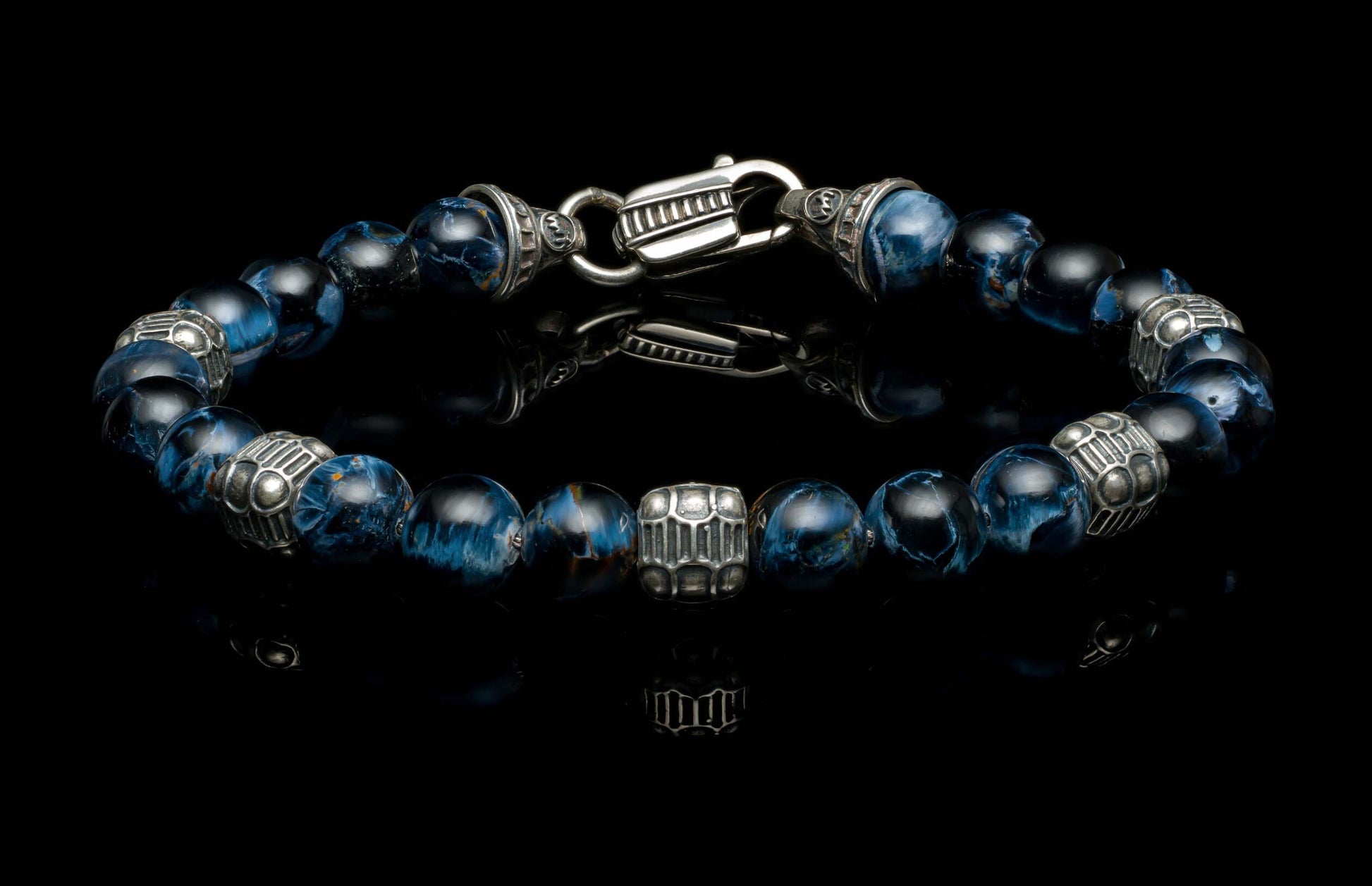 Handcrafted William Henry men's bracelet with Pietersite beads and quilted sterling silver cubes, finished with a custom clasp.