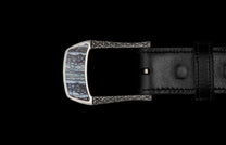 Handcrafted designer belt buckle from William Henry in solid sterling silver inlayed with blue Woolly Mammoth Tooth.  Each inlay is hand-polished from a slice of the molar tooth of the Wooly Mammoth.