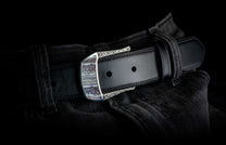 Handcrafted designer belt buckle from William Henry in solid sterling silver inlayed with blue Woolly Mammoth Tooth.  Each inlay is hand-polished from a slice of the molar tooth of the Wooly Mammoth.